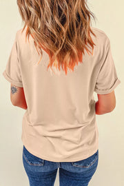Beige cotton t-shirt with rolled sleeves and a graphic print on the arm.