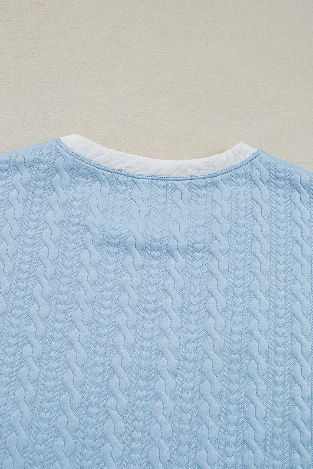 Light blue cable knit loungewear set with contrast white trim detail on neckline.