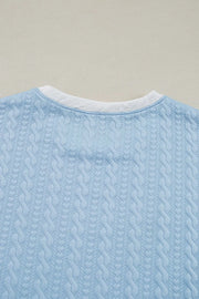 Light blue cable knit loungewear set with contrast white trim detail on neckline.