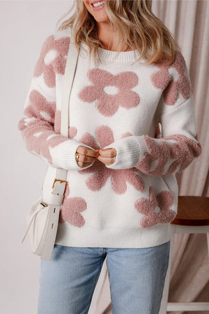 Textured floral knit pullover sweater in white with pink blooms, crewneck, long sleeves.