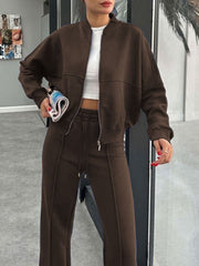 Crimson bomber jacket and wide-leg tracksuit in coffee brown, featuring a zip-up front and drawstring waist.
