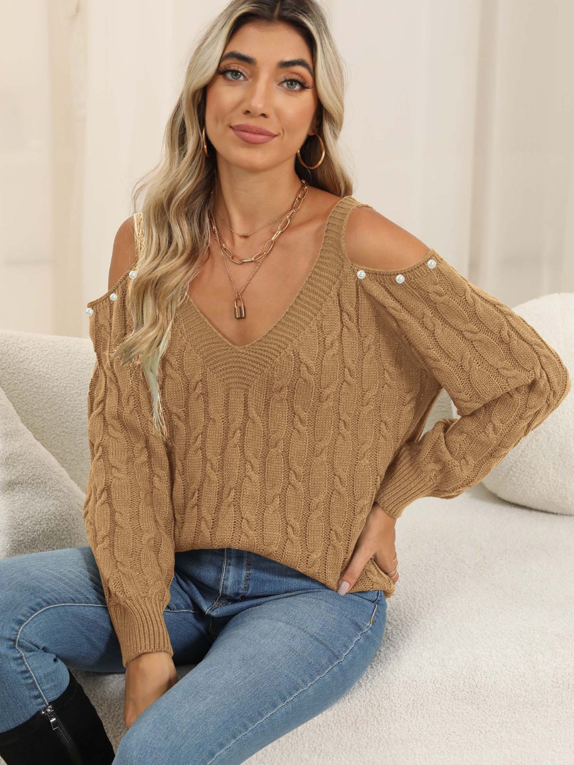 Camel cold-shoulder cable knit sweater with button detail and V-neck