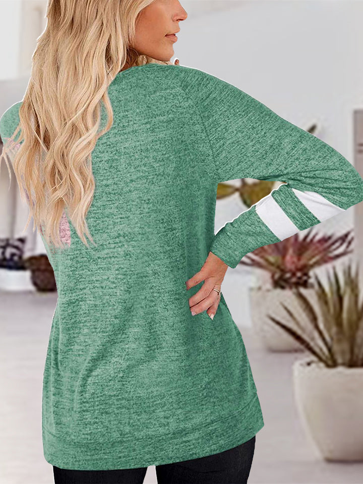 Mid Green raglan t-shirt with white striped sleeves and a heathered texture.