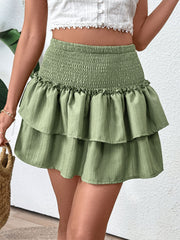 Tiered ruffle mini skirt in matcha green with a smocked waist