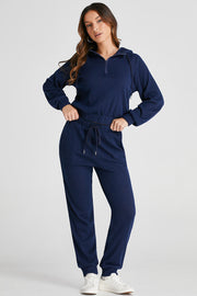 Navy ribbed crop hoodie with quarter zip and matching jogger pants with drawstring.