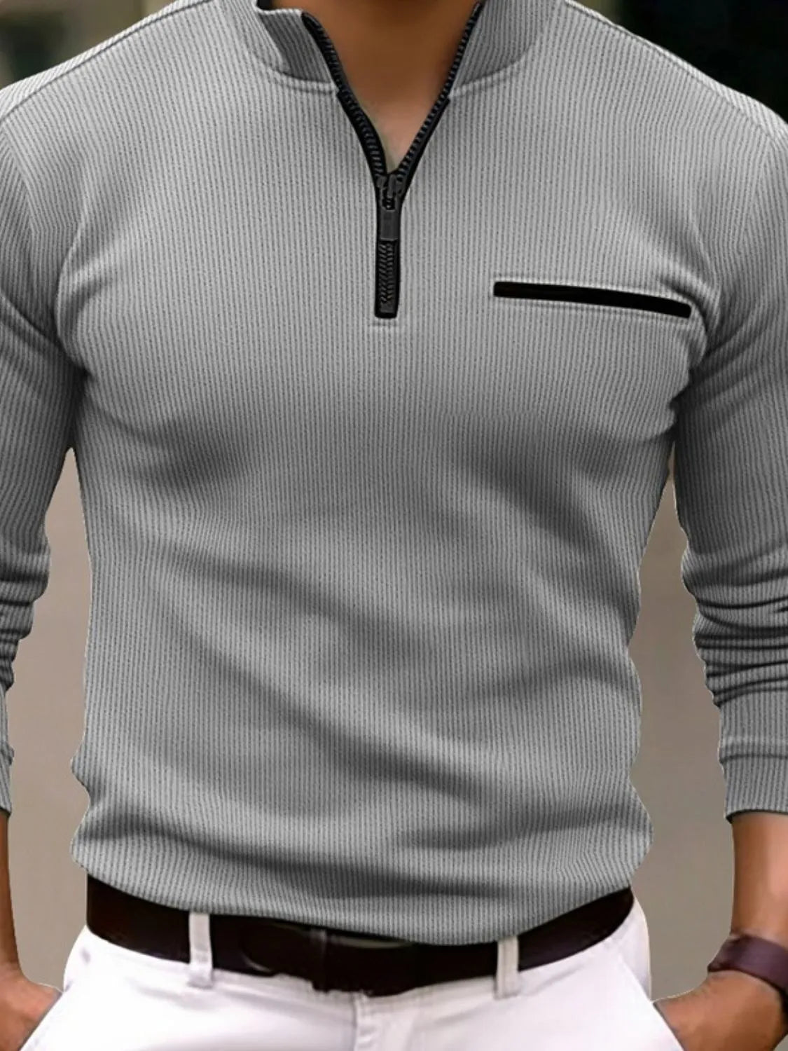 Gray ribbed quarter-zip sweatshirt with black zipper and chest pocket detail.
