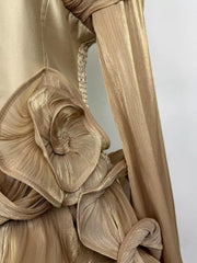 Gold ruffled mini dress with corset waist and ruched sleeve detail.