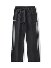 Black men's drawstring sweatpants with reflective side stripes and back pockets.