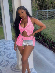 Pink knit halter top with cut-out detail and matching shorts.