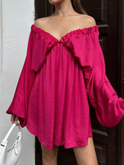 Ruched deep rose V-neck dress with balloon sleeves and textured fabric.