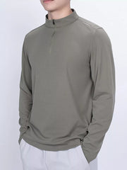 Men's long sleeve quarter-zip t-shirt in Mocha with a stand-up collar and zipper detail.