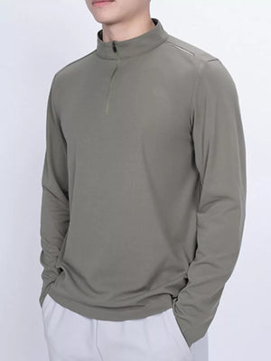Men's long sleeve quarter-zip t-shirt in Mocha with a stand-up collar and zipper detail.