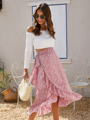 Asymmetric wrap skirt in Dusty Pink with a leaf print and ruffled hem.