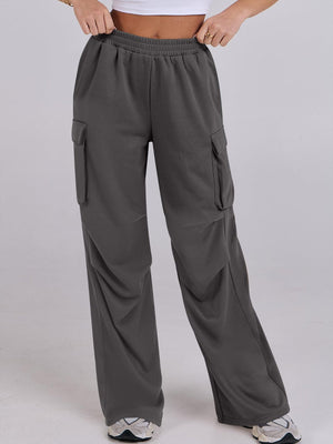 Dark Gray sweatpants with cargo pockets and a wide leg cut.