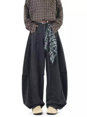 Belted wide-leg vintage wash jeans in dark denim, featuring a relaxed fit and a plaid scarf detail.