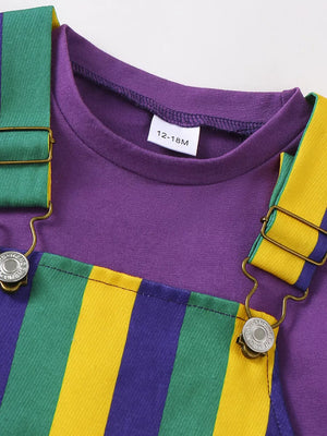 Baby overall dress and tee set with purple tee and striped overalls in green, yellow, and purple.