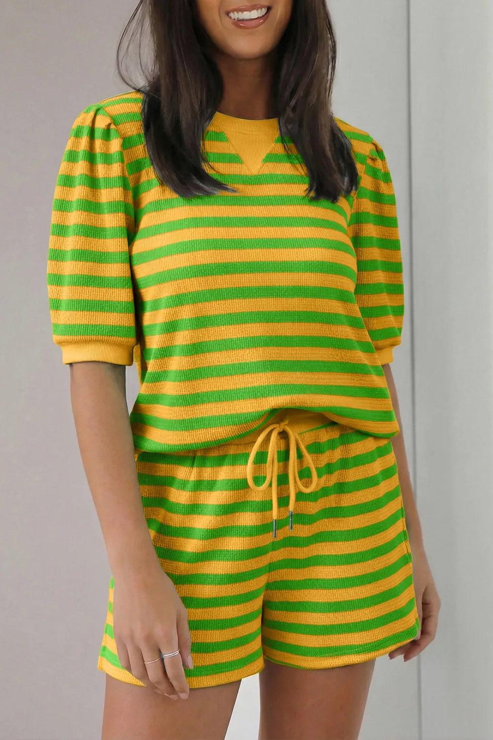 Green and yellow striped puff sleeve top and drawstring shorts set