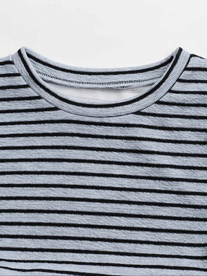 Striped crew neck crop top with textured fabric and black trim.