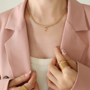 Gold textured chain necklace with a crystal initial Z charm