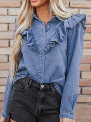 Denim ruffle yoke shirt in medium wash cotton with a collared neckline.