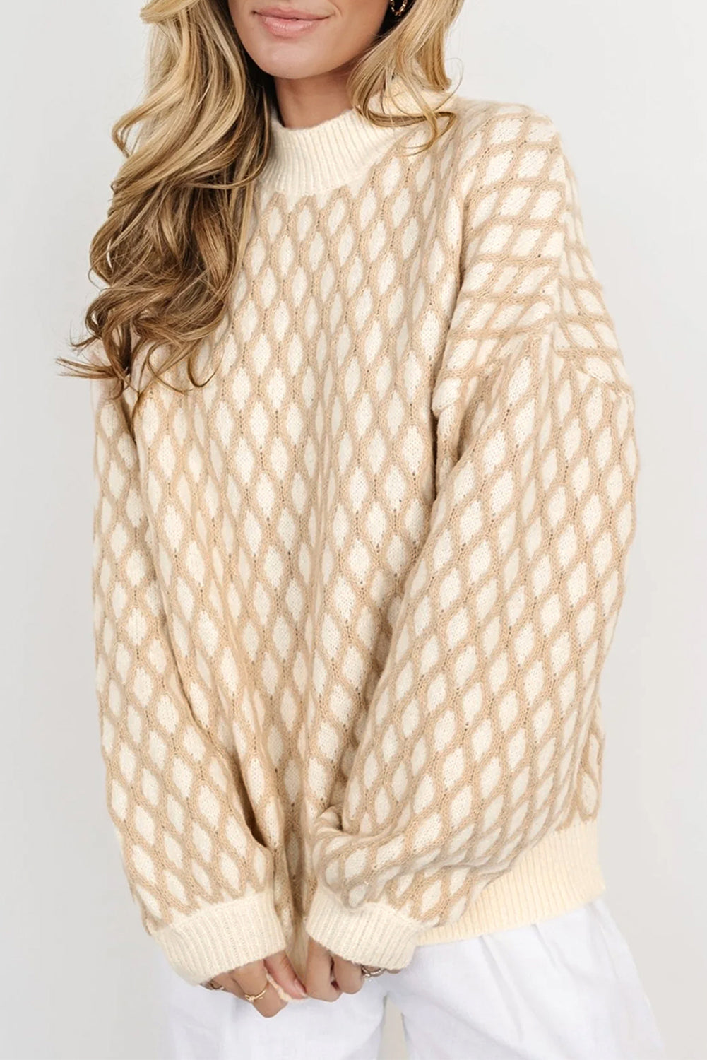 Cream diamond knit balloon sleeve sweater, acrylic, adult casual basic style.