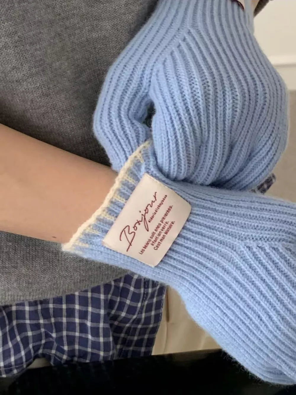 Light blue ribbed knit gloves with scalloped cuff and Bonjour tag