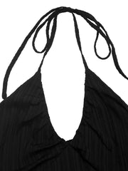 Black ruched halter maxi dress with deep V-neck and tie straps.