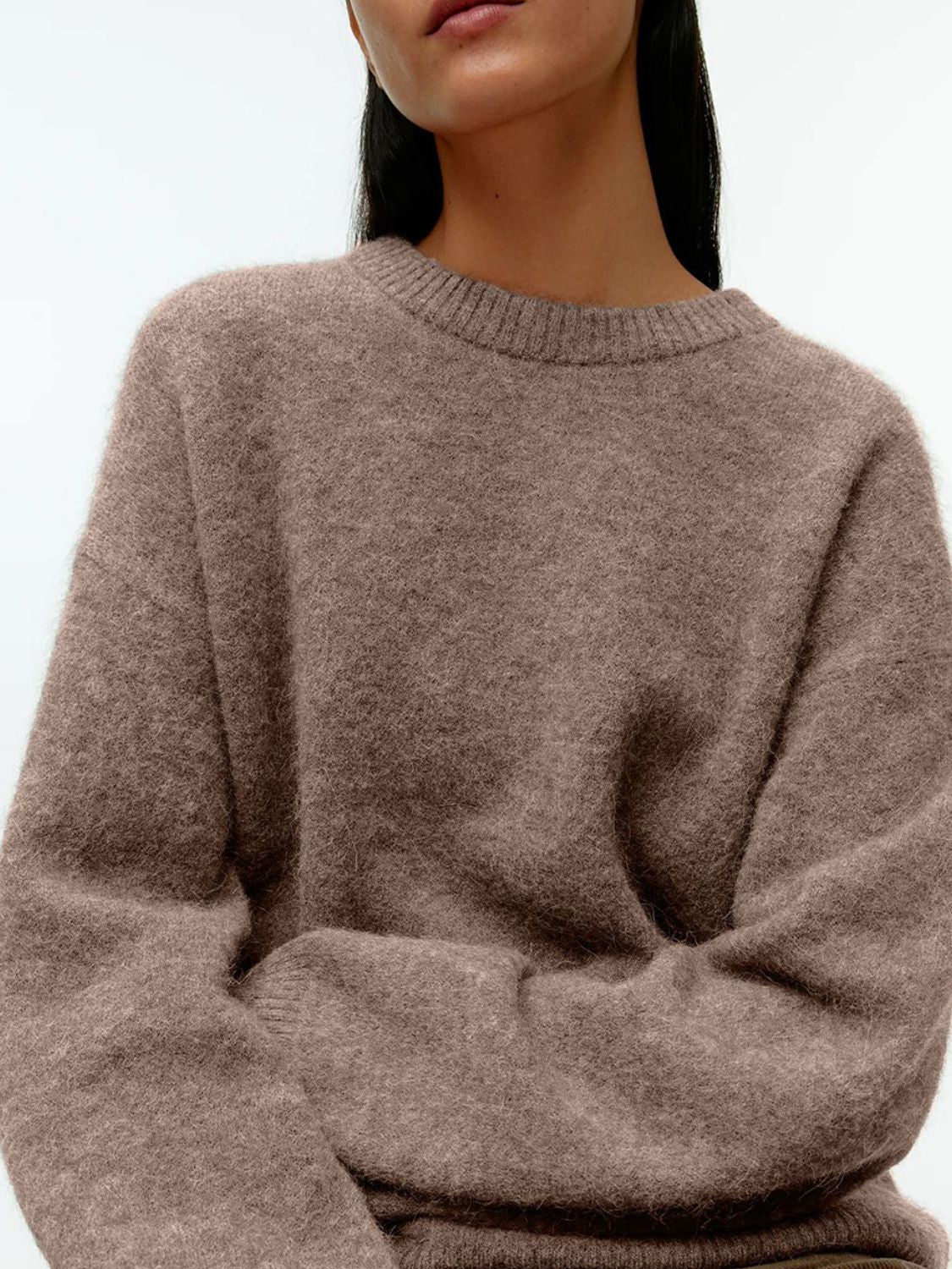 Oversized crewneck sweater in Tan brushed knit acrylic with relaxed fit.
