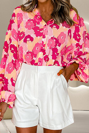 Floral print balloon sleeve blouse in strawberry with button front.