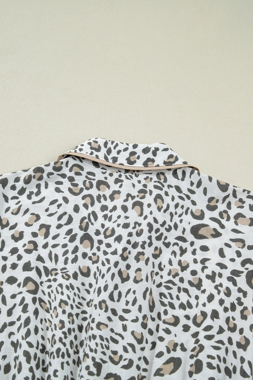 Print button-down midi dress with leopard pattern and contrast collar.