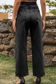 Dark wash split hem straight leg jeans with cropped length.
