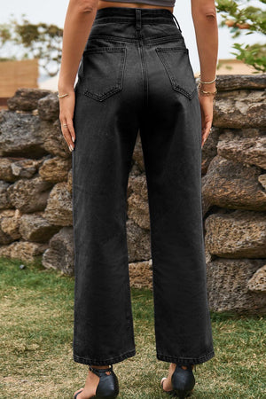 Dark wash split hem straight leg jeans with cropped length.