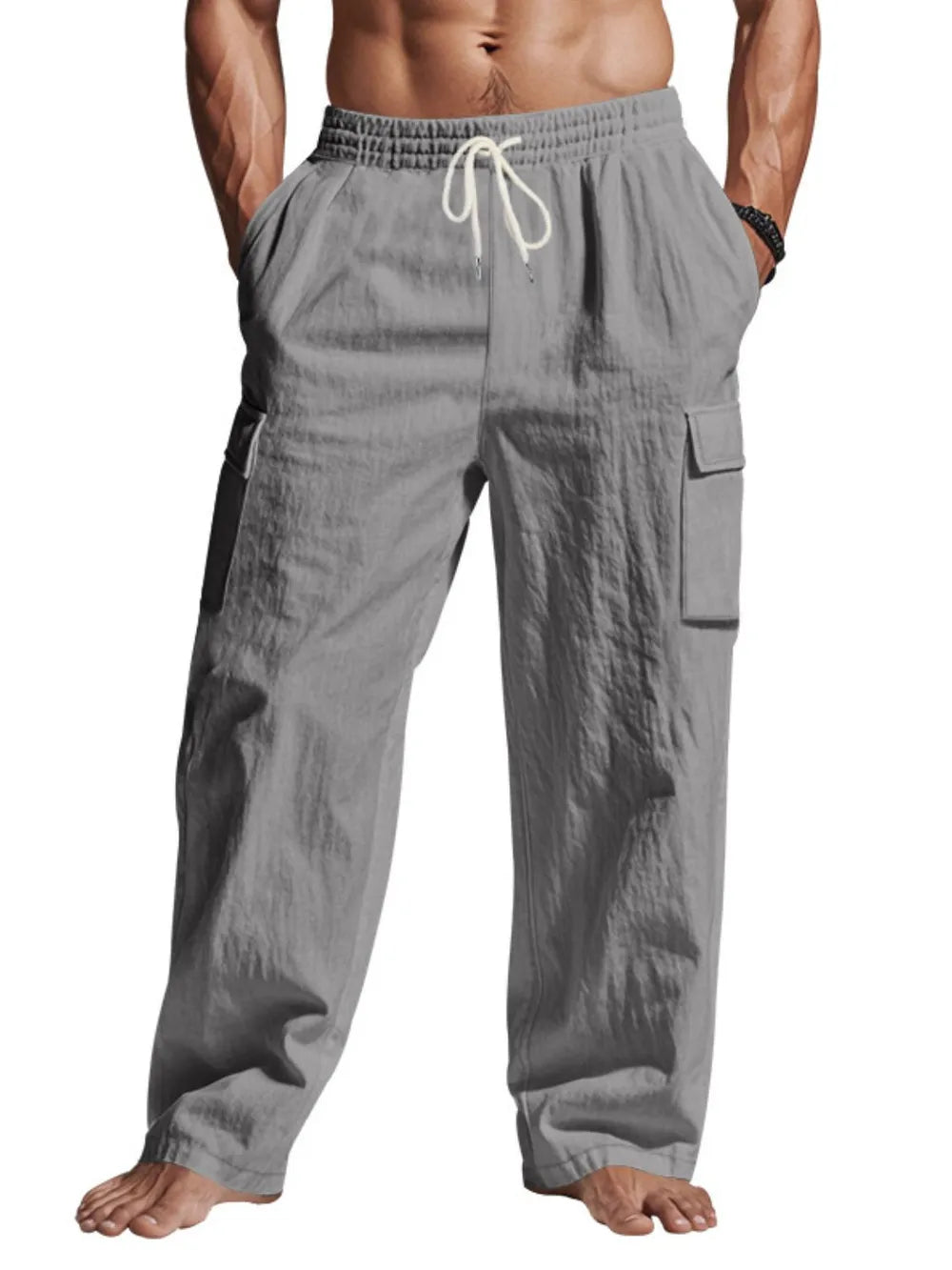 Relaxed-fit dark gray cargo pants with drawstring and side pockets.