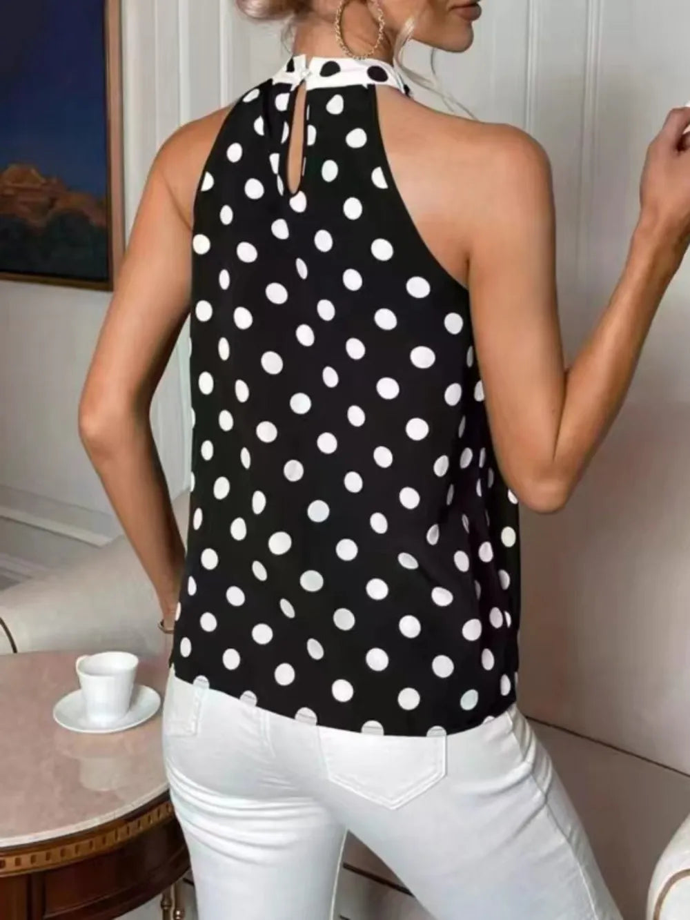 Black polka dot cami with halter neckline and keyhole detail