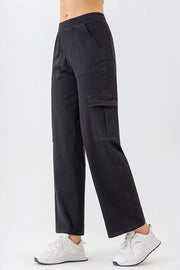 Black utility denim cargo pants with multiple pockets and a relaxed fit.
