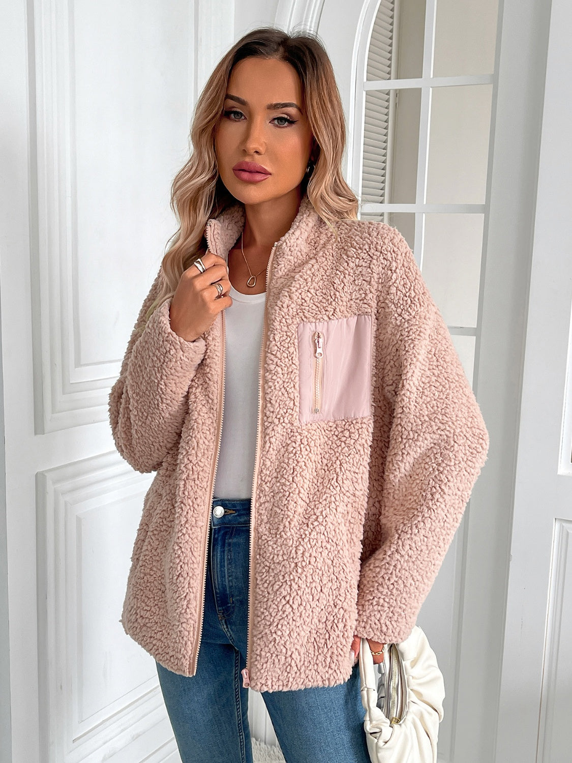 Teddy fleece jacket in watermelon pink with zip front and patch pocket detail.