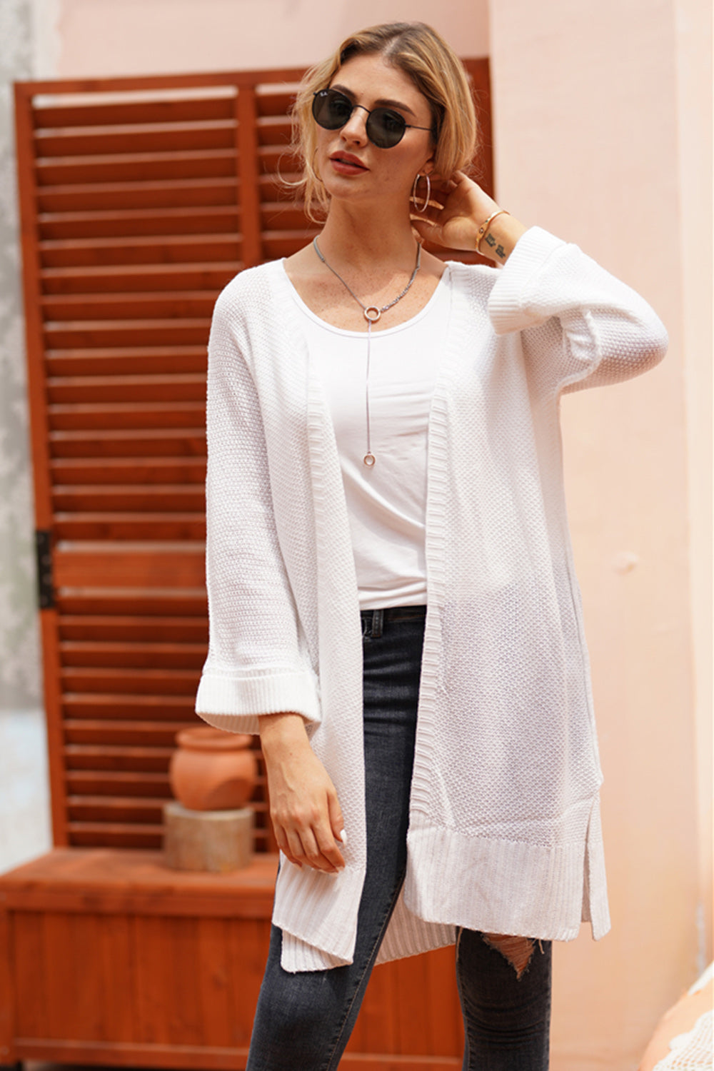 White textured open-front maxi knit cardigan with a relaxed fit and ribbed cuffs.
