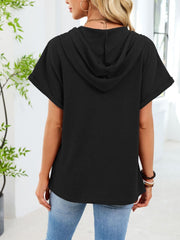 Black waffle knit short sleeve hooded top with rolled cuffs