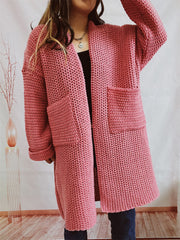Dusty Pink chunky knit cocoon cardigan coat with pockets and open front.