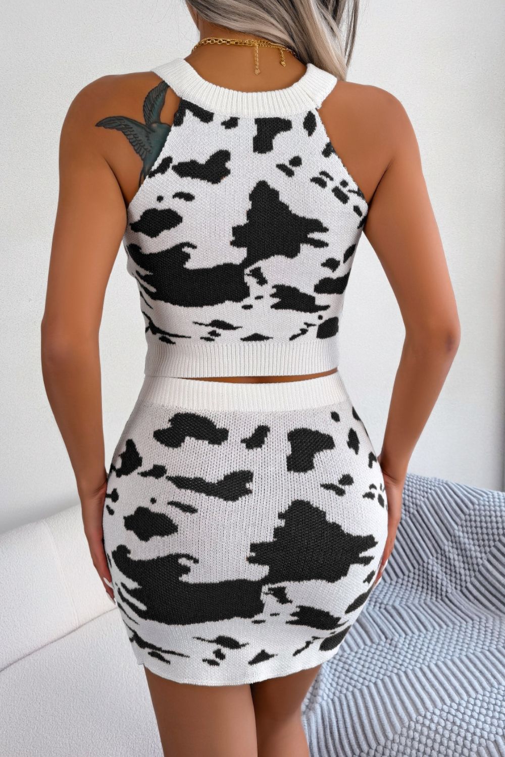 White cow print knit halter crop top and mini skirt set