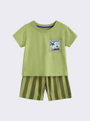Boys' green cotton tee with paradise stamp graphic and striped shorts.