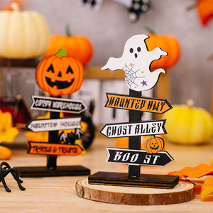 Halloween directional signs with ghost and pumpkin toppers, featuring spooky destinations like Haunted Hwy and Boo St.