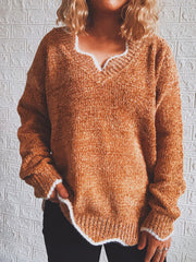 Scalloped trim V-neck acrylic knit sweater in Red Orange with white trim detail.