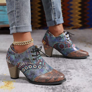 Floral patchwork lace-up ankle boots with block heel in multi-color.