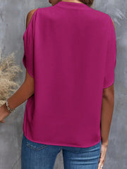 Open-shoulder blouse in magenta polyester with short sleeves and a keyhole neckline detail.