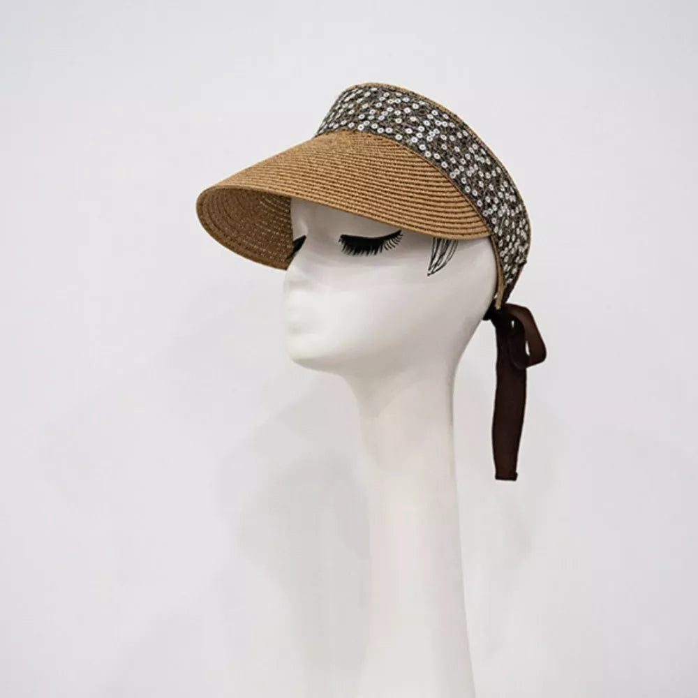 Straw visor hat with sparkling band and ribbon tie