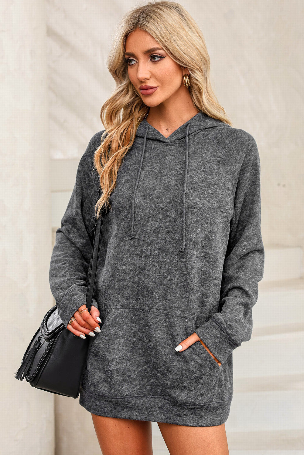 Charcoal textured raglan sleeve hoodie with drawstring hood and front pocket.