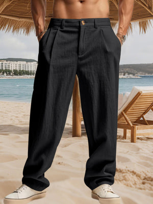 Black relaxed fit sweatpants with pleats and pockets, styled casually.