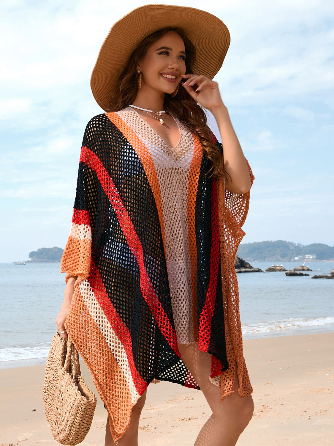 Striped mesh kimono cover-up with V-neck and short sleeves, featuring black, red, orange, and white stripes.