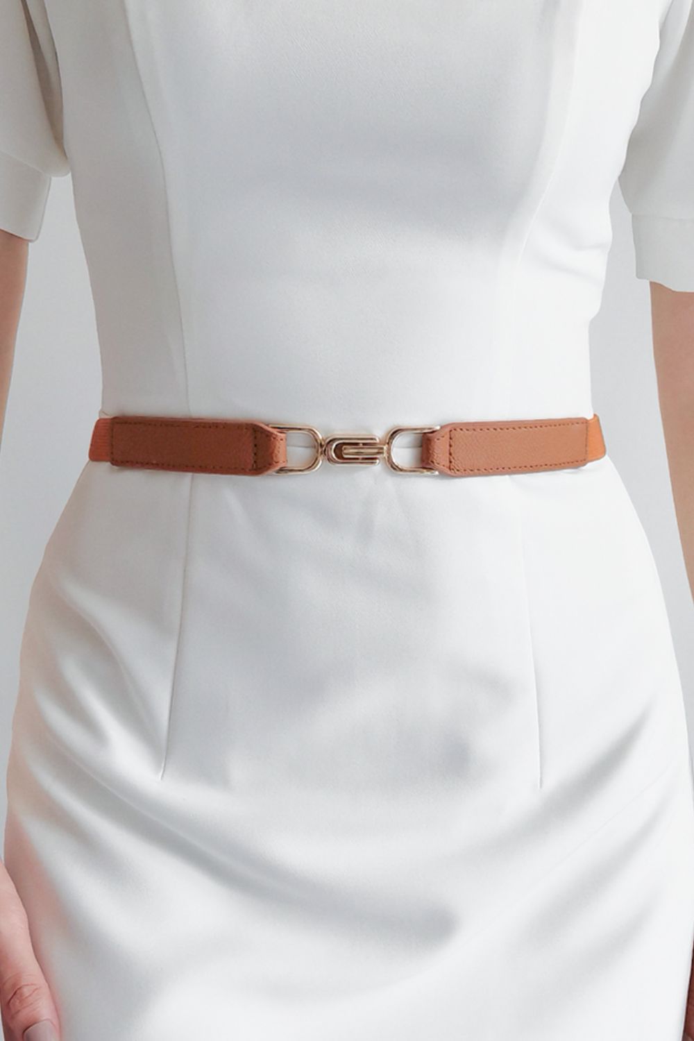Caramel elasticated hook-clasp waist belt with gold-tone alloy buckle.